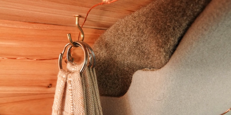 curtains being held up by key rings and hooks